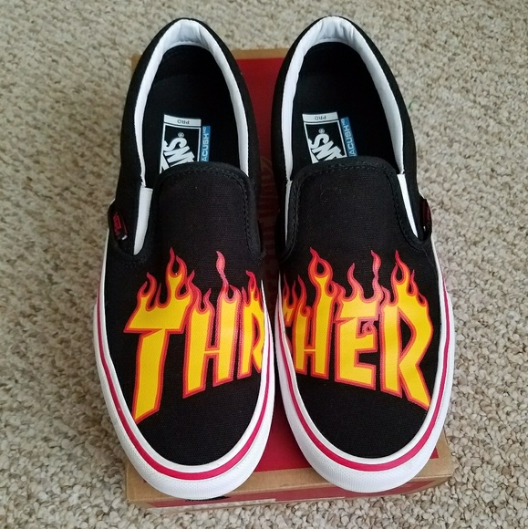 black slip on vans with flames